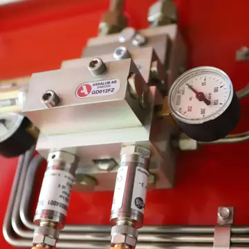 Foto föreställande Assalub Apps - Beräkning för fettdosering och viskositet